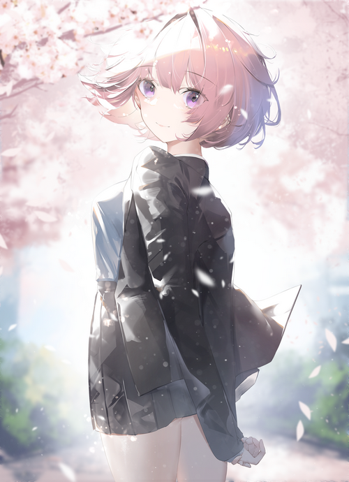 Girl in school uniform under cherry blossoms