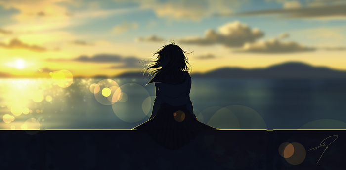 Silhouette of a girl at sunset by the sea