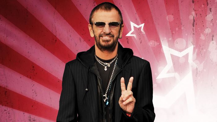 Ringo Starr with peace sign