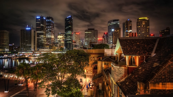4K Sydney cityscape at night with water and lights