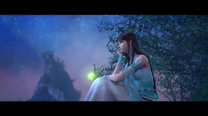 Asian woman in blue dress looking at the night sky
