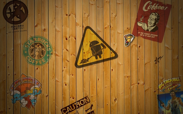 Android Robot, Starbucks, and Smurfs on Wood