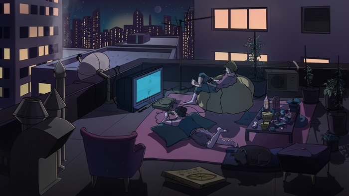 Two people playing video games on a city rooftop at night