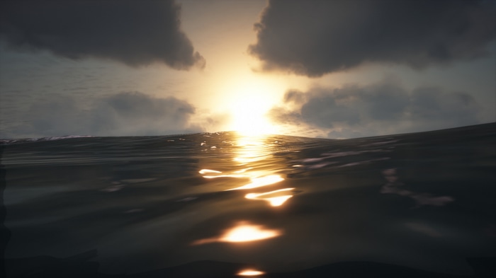 Sunset over ocean waves with clouds