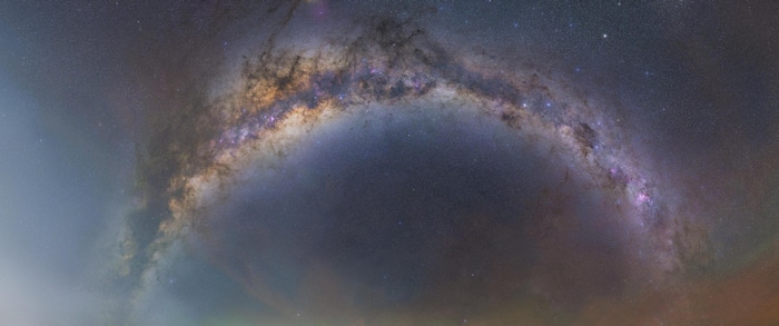 The Milky Way galaxy arches across the night sky