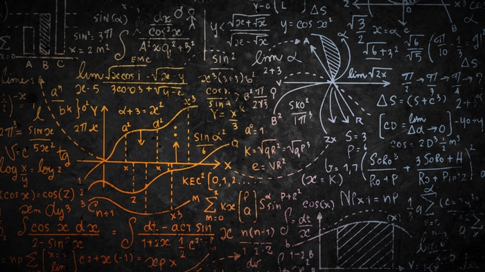 Mathematical Formulas and Equations on a Chalkboard
