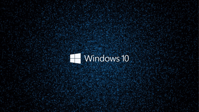 Windows 10 logo on a dark, pixelated background
