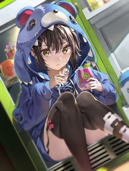 Girl in bear hoodie eating dessert from fridge