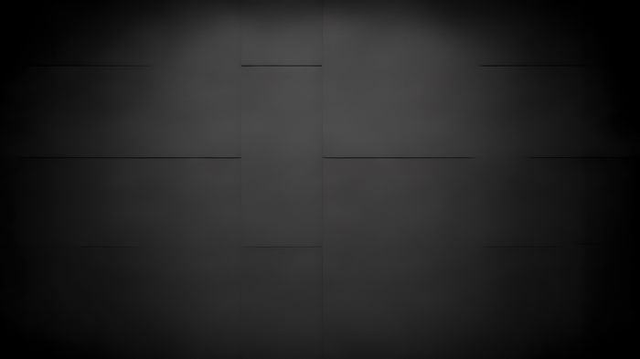 Dark gray textured surface with subtle lighting