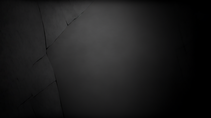Cracked gray surface with dark background