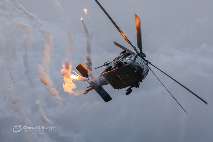 Chinese military helicopter fires flares