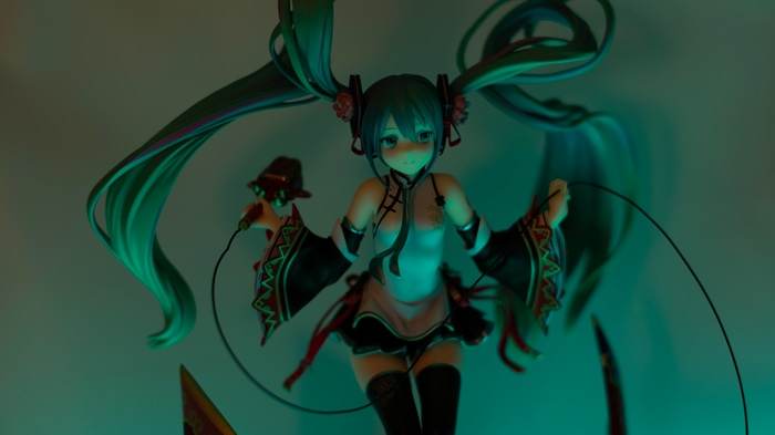 Hatsune Miku figure with Chinese dress and microphone