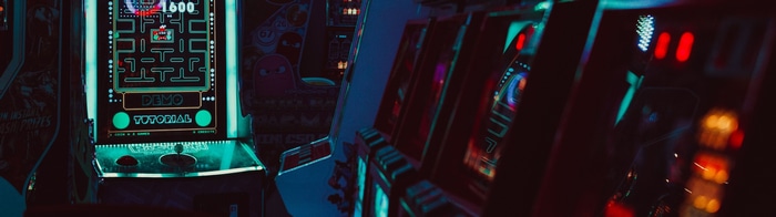 Pac-Man arcade cabinet in a retro arcade