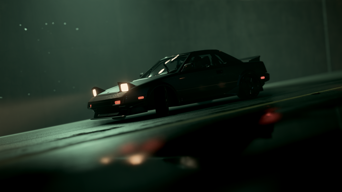 Black Toyota MR2 with pop-up headlights on a wet road