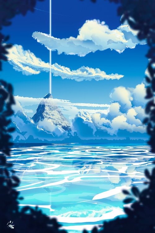Mountain peak with beam of light over the sea