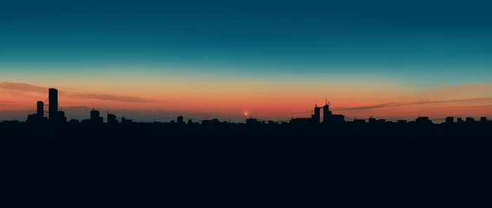4K city skyline silhouette at sunset