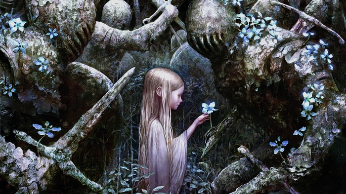 Girl in white dress holding a blue flower in a forest