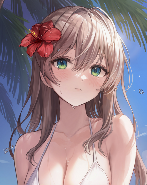 Girl with hibiscus in hair wearing white bikini