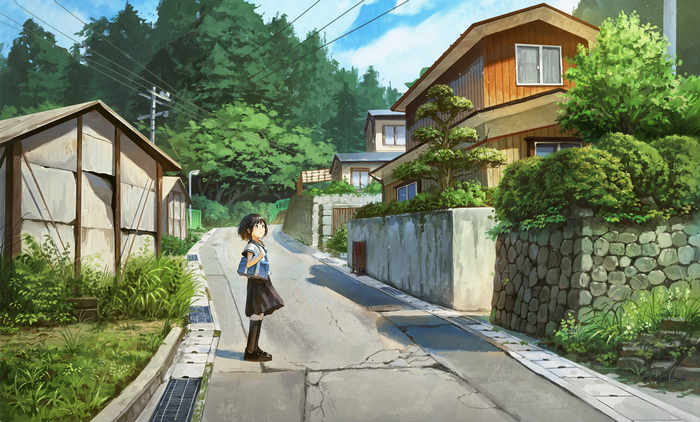 Schoolgirl on a road in a Japanese village