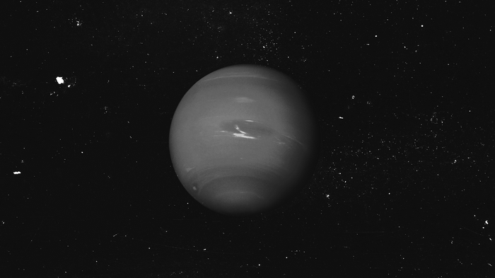 Monochrome image of Neptune in space