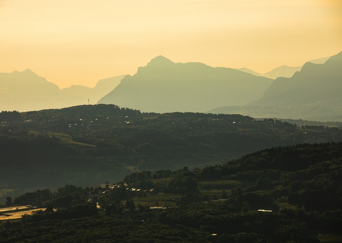 French Alps village and mountains at sunset