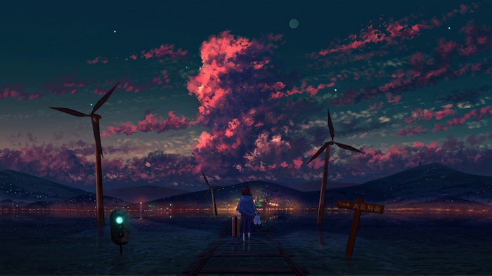 Girl with suitcase on train tracks at sunset