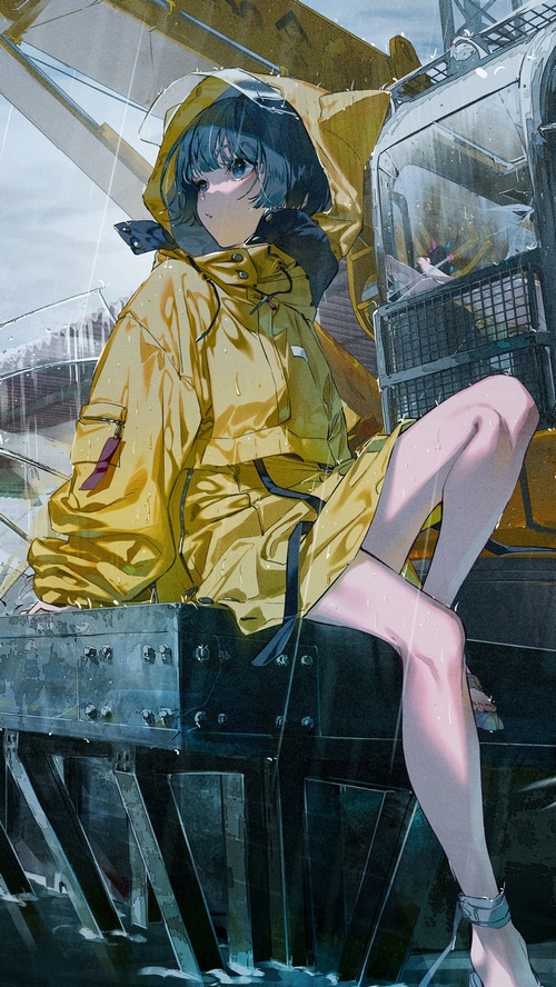 Girl in yellow raincoat sitting in the rain