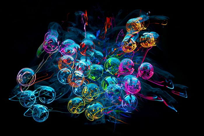 Abstract colorful glass lights on black background