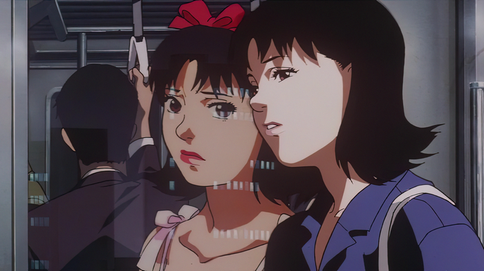 Mima Kirigoe and her reflection on a train