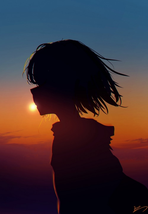 Silhouette of a girl against a sunset