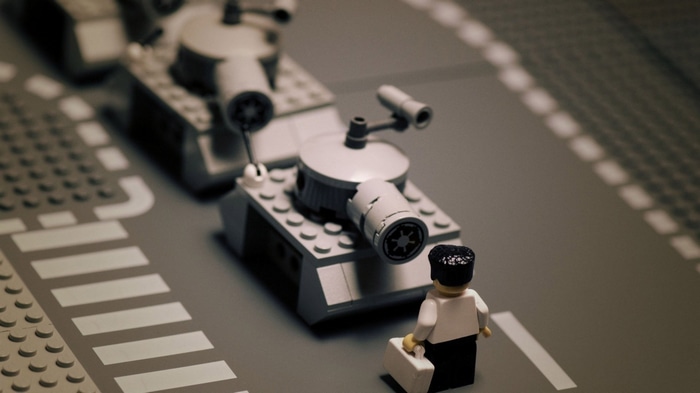 LEGO Tank Man confronts tanks on a street