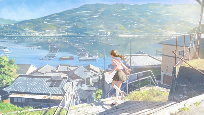 Girl on stairs overlooking a bay with mountains