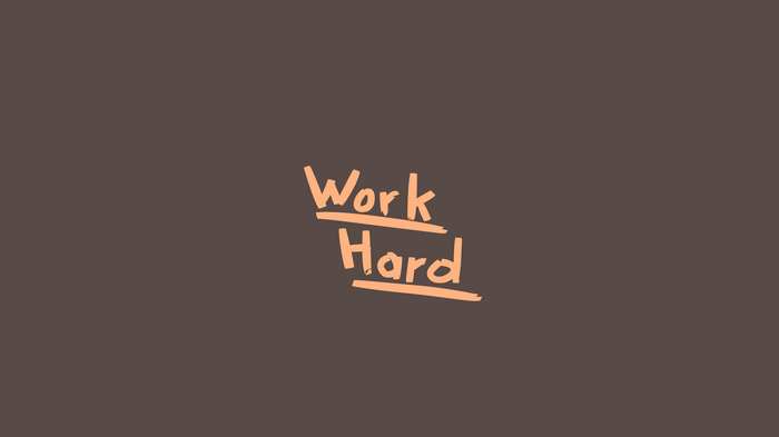 Work Hard motivational text on brown background