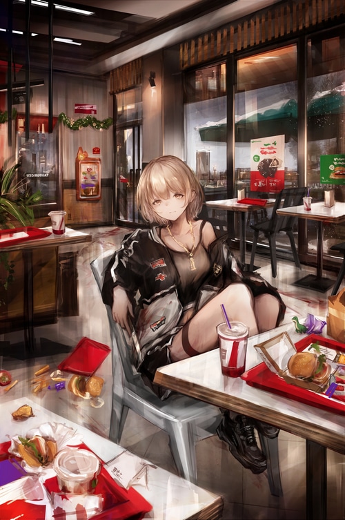 Girl in fast food restaurant with burgers and drinks
