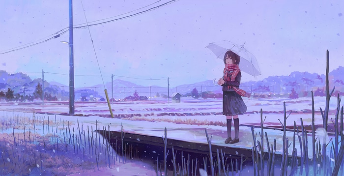Schoolgirl with umbrella in the snow
