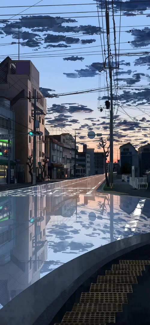 Street view with reflections of buildings and clouds