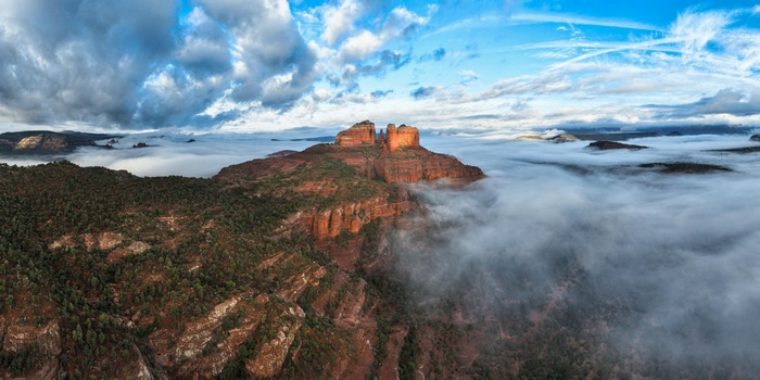 Cathedral Rock in Sedona, Arizona surrounded by mist