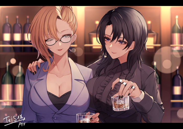 Two women with drinks at a bar