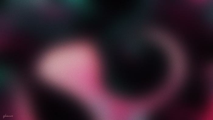 Abstract blurred pink and black gradient with grain