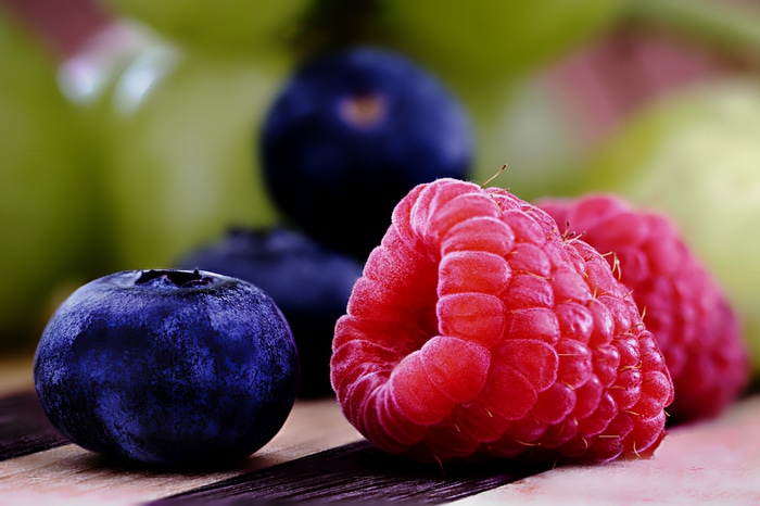4K still life of blueberries and raspberries