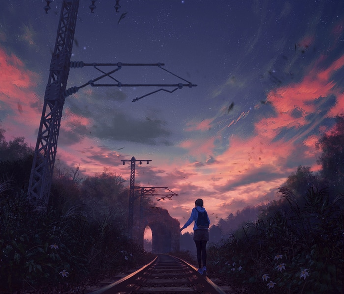 Girl walking on railway tracks at dusk
