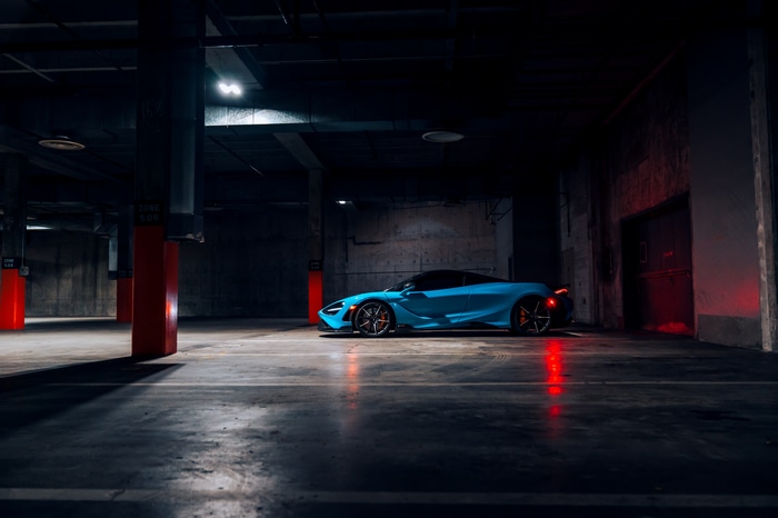 4K McLaren car in a dark parking garage