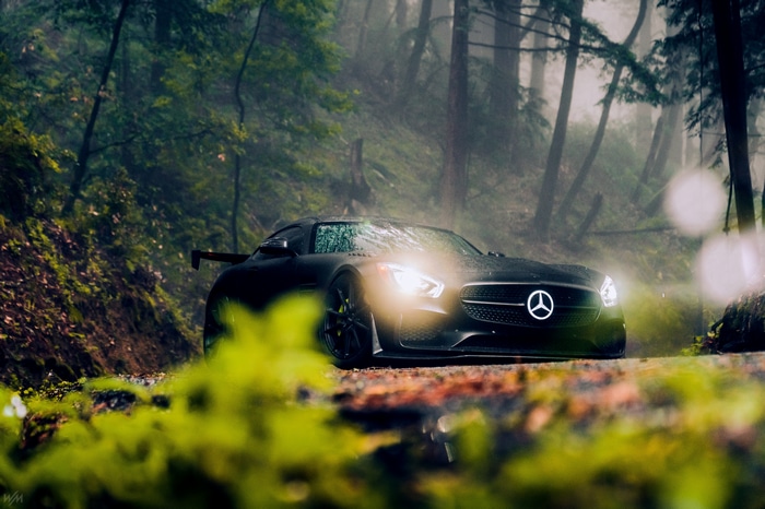 4K Mercedes-Benz car with headlights in forest