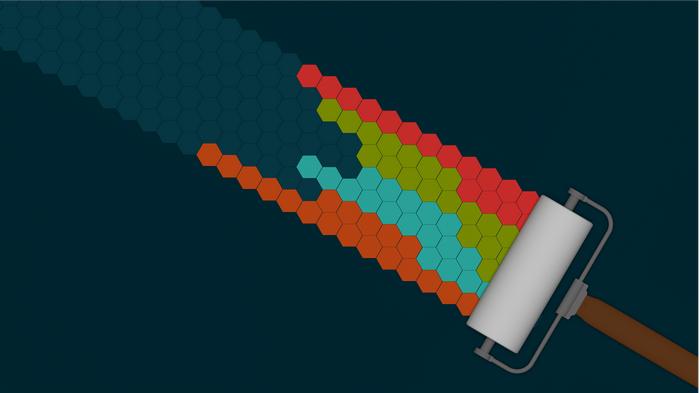 Paint roller applying colorful hexagons