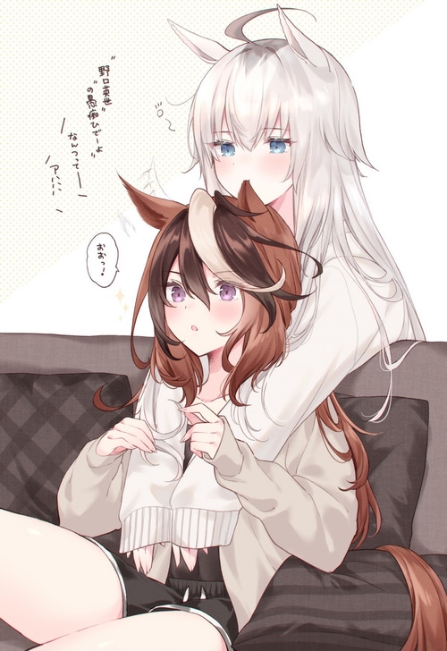 Two anime girls with horse ears on a couch