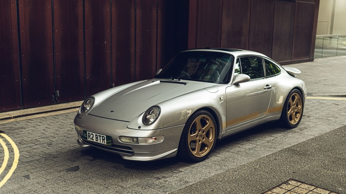Silver Porsche 993 RUF with gold wheels