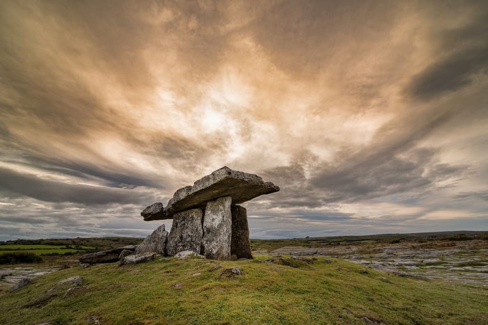 Poulnabrone Dolmen in Ireland under a cloudy sky