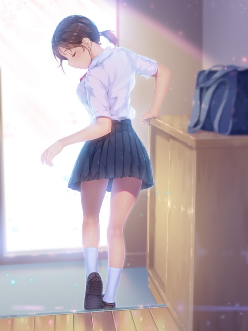 Schoolgirl in uniform with a backpack