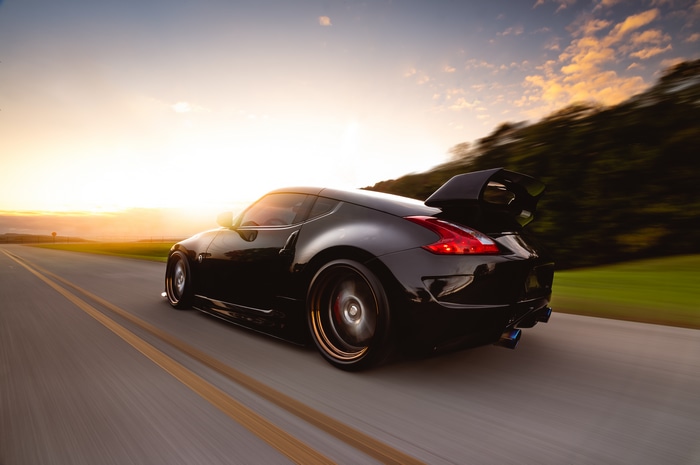 4K Nissan 370Z driving at sunset