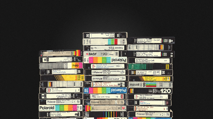 Stack of VHS and Polaroid Tapes